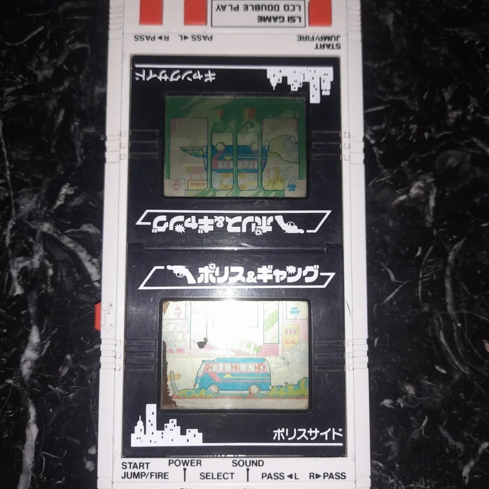 LSI BANDAI ELECTRONICS LCD DOUBLE PLAY POLICE & GANG MADE IN JAPAN 1984